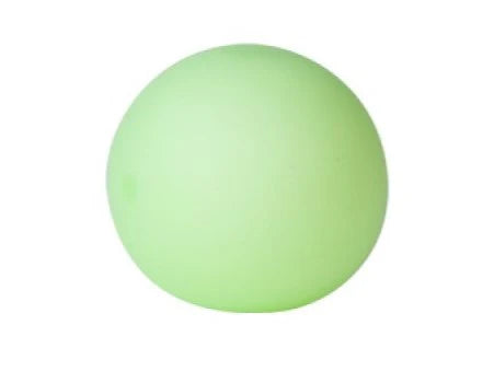 Green Squish Ball glow in the dark plain white background close up